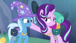 Size: 1280x720 | Tagged: safe, screencap, character:starlight glimmer, character:trixie, species:pony, episode:to where and back again, g4, my little pony: friendship is magic, hoof in mouth, jewelry, necklace, saddle bag, trixie's hat