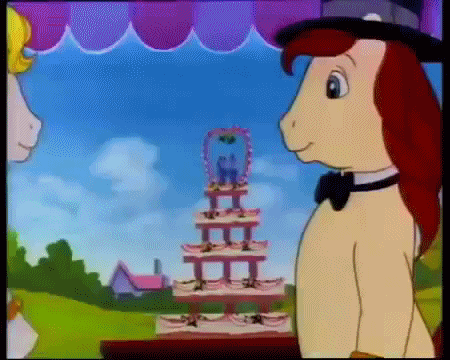Size: 450x360 | Tagged: safe, screencap, character:cheval, character:meadowlark, species:pony, episode:sister of the bride, g1, my little pony tales, animated, bipedal, chevalark, female, gif, kissing, male, marriage, meadowval, ring, shipping, straight, wedding, wedding cake, wedding ring