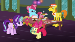 Size: 1920x1080 | Tagged: safe, screencap, character:apple bloom, character:carrot cake, character:cup cake, character:starlight glimmer, species:pony, episode:a hearth's warming tail, g4, my little pony: friendship is magic, cake, cookie, cupcake, cutie mark, female, filly, food, magic, musical instrument, pie, tambourine, telekinesis, the cmc's cutie marks