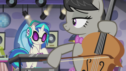 Size: 1280x720 | Tagged: safe, screencap, character:dj pon-3, character:octavia melody, character:vinyl scratch, species:earth pony, species:pony, species:unicorn, episode:slice of life, g4, my little pony: friendship is magic, bow (instrument), bow tie, cello, cello bow, electric piano, headphones, musical instrument, turntable