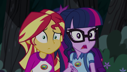 Size: 1280x720 | Tagged: safe, screencap, character:sunset shimmer, character:twilight sparkle, character:twilight sparkle (scitwi), species:eqg human, equestria girls:legend of everfree, g4, my little pony:equestria girls, backpack, camp everfree outfits, clothing, glasses, reaction