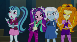 Size: 1280x714 | Tagged: safe, screencap, character:adagio dazzle, character:aria blaze, character:sonata dusk, character:trixie, equestria girls:rainbow rocks, g4, my little pony:equestria girls, bracelet, clothing, evil grin, fall formal outfits, fingerless gloves, gem, gloves, grin, hand on hip, hand on shoulder, jewelry, necktie, pendant, siren gem, smiling, spikes, the dazzlings
