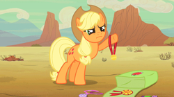 Size: 497x279 | Tagged: safe, screencap, character:applejack, episode:the last roundup, g4, my little pony: friendship is magic, faec, medal, reaction image, ribbon, solo