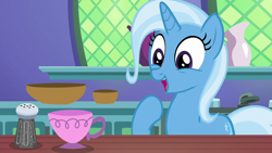 Size: 1280x720 | Tagged: safe, screencap, character:trixie, species:pony, species:unicorn, episode:all bottled up, g4, my little pony: friendship is magic, cup, cute, diatrixes, female, kitchen, mare, open mouth, pepper shaker, raised hoof, solo, teacup, that pony sure does love teacups