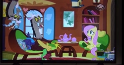 Size: 665x351 | Tagged: safe, screencap, character:discord, character:fluttershy, species:pony, episode:discordant harmony, g4, my little pony: friendship is magic, boomerang (tv channel), fluttershy's cottage, television