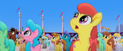 Size: 1021x425 | Tagged: safe, official, screencap, character:melody star, character:nougat praliné, character:open skies, species:earth pony, species:pony, species:unicorn, my little pony: the movie (2017), angel aura, animation error, background pony, background pony audience, canterlot, chocolate apple, female, glitter glow, male, mare, silver dust, stallion, sunkiss, unnamed pony, wingless