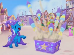 Size: 715x536 | Tagged: safe, screencap, character:dawn sunrays, character:trixie, species:earth pony, species:pony, species:unicorn, my little pony: the movie (2017), canterlot, cape, clothing, cropped, eyes closed, female, fireworks, happy, hat, mare, rearing, trixie's cape, trixie's hat, unnamed pony