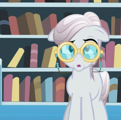 Size: 769x763 | Tagged: safe, screencap, character:amethyst maresbury, species:crystal pony, species:pony, episode:the crystal empire, g4, my little pony: friendship is magic, agate, book, cropped, elderly, female, glasses, librarian, mare, open mouth, solo