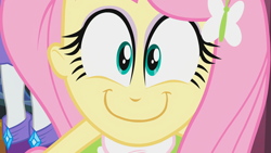 Size: 1920x1080 | Tagged: safe, screencap, character:fluttershy, character:rarity, equestria girls:equestria girls, g4, my little pony:equestria girls, close-up, face of mercy, faec, female, grin, happy, happyshy, smiling, solo