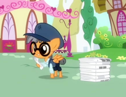 Size: 436x337 | Tagged: safe, screencap, species:pegasus, species:pony, episode:daring done, clothing, colt, cropped, hat, male, newspaper, printing press (character), solo