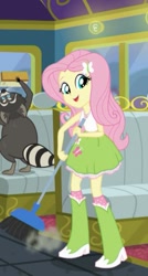 Size: 385x720 | Tagged: safe, screencap, character:fluttershy, episode:get the show on the road, eqg summertime shorts, g4, my little pony:equestria girls, boots, broom, clothing, raccoon, shoes, skirt, smiling