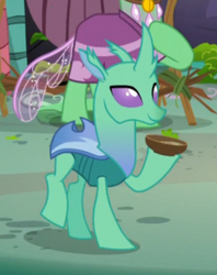 Size: 347x439 | Tagged: safe, screencap, species:changeling, species:reformed changeling, episode:to change a changeling, g4, my little pony: friendship is magic, background changeling, changeling food, cropped, food, smiling, solo focus, soup, soupling, walking
