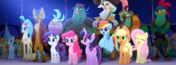 Size: 1920x704 | Tagged: safe, screencap, character:applejack, character:boyle, character:cantaloupe, character:capper dapperpaws, character:captain celaeno, character:fluttershy, character:lix spittle, character:mullet, character:murdock, character:pinkie pie, character:princess skystar, character:rainbow dash, character:rarity, character:twilight sparkle, character:twilight sparkle (alicorn), species:abyssinian, species:alicorn, species:anthro, species:classical hippogriff, species:earth pony, species:hippogriff, species:pegasus, species:pony, species:unicorn, my little pony: the movie (2017), anthro with ponies, background pony, background pony audience, female, happy, male, mane six, mare, parrot pirates, pirate, rainbow (song), stallion, unnamed pony