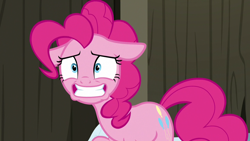 Size: 1280x720 | Tagged: safe, screencap, character:pinkie pie, species:pony, episode:not asking for trouble, g4, my little pony: friendship is magic, floppy ears, grin, nervous, nervous grin, smiling, solo