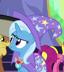 Size: 628x706 | Tagged: safe, screencap, character:cherry berry, character:discord, character:trixie, episode:celestial advice, g4, my little pony: friendship is magic, cape, clothing, hat, solo focus, trixie's cape, trixie's hat, unamused