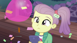 Size: 1920x1080 | Tagged: safe, screencap, episode:pinkie sitting, g4, my little pony:equestria girls, balloon, confetti, female, lily pad (equestria girls), phone, puzzled, smartphone, solo, young