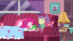 Size: 1920x1080 | Tagged: safe, screencap, character:pinkie pie, episode:pinkie sitting, g4, my little pony:equestria girls, clothing, couch, duo, duo female, female, hairband, jacket, lily pad (equestria girls), magical geodes, out of context, pants, side ponytail, smiling, young