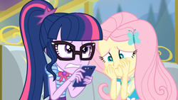 Size: 1920x1080 | Tagged: safe, screencap, character:fluttershy, character:twilight sparkle, character:twilight sparkle (scitwi), species:eqg human, episode:road trippin', g4, my little pony:equestria girls, cellphone, phone, smartphone