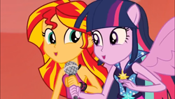 Size: 1366x768 | Tagged: safe, screencap, character:sunset shimmer, character:twilight sparkle, equestria girls:rainbow rocks, g4, my little pony:equestria girls, 8^y, faec, happy, microphone, ooh, ponied up, smiling, spread wings, wings
