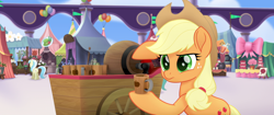 Size: 1920x804 | Tagged: safe, screencap, character:applejack, my little pony: the movie (2017), applejack's hat, balloon, bow, cake, cart, cider, clothing, confused, cotton candy, cowboy hat, flag, food, hat, hoof hold, jug, mug, ribbon, serious, tankard