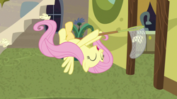 Size: 1280x720 | Tagged: safe, screencap, character:fluttershy, species:pegasus, species:pony, episode:discordant harmony, g4, my little pony: friendship is magic, butterfly net, butterfly sandwich, cute, happy, shyabetes, solo