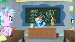 Size: 1280x720 | Tagged: safe, screencap, character:gallus, character:rainbow dash, character:sandbar, character:silverstream, species:classical hippogriff, species:griffon, species:hippogriff, episode:school daze, g4, my little pony: friendship is magic, chalkboard, jewelry, necklace, paintbrush, pencil, photo frame, pointer, quill, ruler, trophy