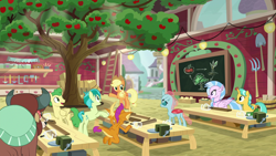 Size: 1920x1080 | Tagged: safe, screencap, character:applejack, character:citrine spark, character:fire quacker, character:huckleberry, character:ocellus, character:sandbar, character:silverstream, character:smolder, character:yona, species:changeling, species:classical hippogriff, species:dragon, species:earth pony, species:hippogriff, species:pegasus, species:pony, species:reformed changeling, species:unicorn, species:yak, episode:school daze, g4, my little pony: friendship is magic, season 8, apple tree, background pony, chalkboard, classroom, female, friendship always wins, friendship student, goggles, hay, hay bale, jewelry, ladder, lantern, male, necklace, pitchfork, saw, school of friendship, shovel, stallion, tools, traditional art, tree, vise, wood, woodwork, workshop