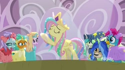 Size: 1920x1080 | Tagged: safe, screencap, character:fluttershy, character:gallus, character:ocellus, character:sandbar, character:silverstream, character:smolder, character:yona, species:pegasus, species:pony, episode:horse play, g4, my little pony: friendship is magic, celestia costume, celestia's crown, cosplay, costume, crown, discovery family logo, eyes closed, fake horn, female, jewelry, mare, play, raised hoof, regalia, shylestia, spotlight, star swirl the bearded costume, student six