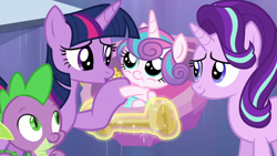 Size: 1280x720 | Tagged: safe, screencap, character:princess flurry heart, character:spike, character:starlight glimmer, character:twilight sparkle, character:twilight sparkle (alicorn), species:alicorn, species:pony, episode:the times they are a changeling, g4, my little pony: friendship is magic, baby, baby pony, carriage, cute, dawwww, diaper, flurrybetes, foal, magic, smiling