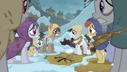 Size: 1280x720 | Tagged: safe, screencap, character:doctor whooves, character:lucky clover, character:shady daze, character:time turner, species:earth pony, species:pony, episode:hearth's warming eve, g4, my little pony: friendship is magic, amaranthine, background pony, bags under eyes, burlap, charcoal bakes, cold, dry wheat, earth pony tribe, female, filly, flurry, male, mare, peasant, rags, snow, stallion