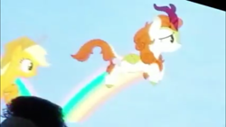 Size: 1280x720 | Tagged: safe, screencap, character:applejack, character:autumn blaze, species:kirin, species:pony, episode:sounds of silence, g4, my little pony: friendship is magic, season 8, female, leaping, mare, rainbow, sdcc, sdcc 2018