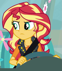 Size: 507x578 | Tagged: safe, screencap, character:sunset shimmer, episode:driving miss shimmer, g4, my little pony:equestria girls, cropped, driving miss shimmer: fluttershy, female, fluttershy's car, geode of empathy, magical geodes, seatbelt, solo, steering wheel