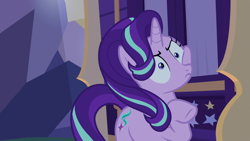 Size: 1280x720 | Tagged: safe, screencap, character:starlight glimmer, species:pony, species:unicorn, episode:to where and back again, g4, my little pony: friendship is magic, female, mare, raised hoof, solo, trixie's wagon