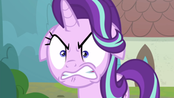 Size: 1670x939 | Tagged: safe, screencap, character:starlight glimmer, species:pony, species:unicorn, episode:the parent map, g4, season 8, angry, angry face, face, floppy ears, gritted teeth, house, rage, ragelight glimmer, shrunken pupils, sire's hollow, solo, tree, window