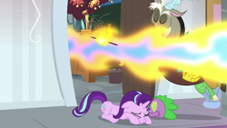 Size: 1280x720 | Tagged: safe, screencap, character:discord, character:spike, character:starlight glimmer, species:draconequus, species:dragon, species:pony, species:unicorn, episode:a matter of principals, g4, my little pony: friendship is magic, dragonfire, dragonsneeze, female, fire, food, male, mare, marshmallow, prone, rainbow fire, trio