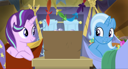 Size: 1735x937 | Tagged: safe, screencap, character:starlight glimmer, character:trixie, species:pony, species:unicorn, episode:on the road to friendship, duo, duo female, female, hammock, mare, smiling, trixie's wagon