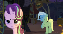 Size: 1734x938 | Tagged: safe, screencap, character:starlight glimmer, character:trixie, species:pony, species:unicorn, episode:on the road to friendship, annoyed, bags under eyes, campfire, duo, duo female, female, mare, night, trixie's wagon
