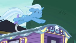 Size: 1280x720 | Tagged: safe, screencap, character:trixie, species:pony, species:unicorn, episode:on the road to friendship, eyes closed, female, floppy ears, leaping, mare, smiling, solo, trixie's wagon, wagon