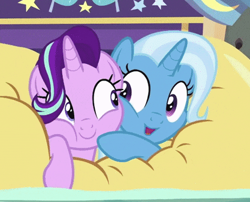 Size: 438x354 | Tagged: safe, screencap, character:starlight glimmer, character:trixie, species:pony, species:unicorn, episode:on the road to friendship, cheek squish, cheek to cheek, cropped, cute, diatrixes, duo, eye contact, female, friendshipping, ghastly gorge, glimmerbetes, i guess we're stuck together, inflatable, inflatable raft, looking at each other, mare, prone, raft, shipping fuel, smiling, snuggling, squished, squishy, squishy cheeks, trixie's wagon, we're friendship bound