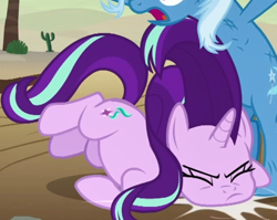 Size: 574x458 | Tagged: safe, screencap, character:starlight glimmer, character:trixie, species:pony, species:unicorn, episode:on the road to friendship, cropped, duo, duo female, faceplant, falling, female, mare, messy mane, solo focus