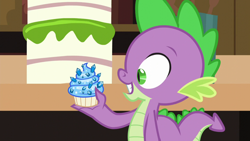 Size: 1280x720 | Tagged: safe, screencap, character:spike, species:dragon, episode:princess spike, g4, my little pony: friendship is magic, cupcake, food, male, sapphire, sapphire cupcake, solo