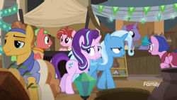 Size: 1920x1080 | Tagged: safe, screencap, character:pepperberry (g4), character:starlight glimmer, character:trixie, species:earth pony, species:pegasus, species:pony, species:unicorn, episode:on the road to friendship, background pony, clothing, discovery family logo, female, glowpaz, headband, jewelry, male, mare, market, necklace, pants, scarf, shirt, stallion, trixie is not amused, unamused, unnamed pony, vase, vendor, vendor stall