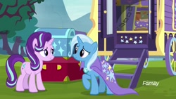 Size: 1920x1080 | Tagged: safe, screencap, character:starlight glimmer, character:trixie, species:pony, species:unicorn, episode:on the road to friendship, cape, clothing, eye contact, female, looking at each other, mare, smiling, trixie's cape, trixie's wagon
