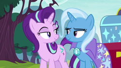 Size: 1280x720 | Tagged: safe, screencap, character:starlight glimmer, character:trixie, species:pony, species:unicorn, episode:on the road to friendship, cape, clothing, duo, eye contact, female, lidded eyes, looking at each other, mare, shipping fuel, tree, trixie's cape