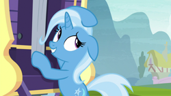 Size: 1280x720 | Tagged: safe, screencap, character:trixie, species:pony, species:unicorn, episode:on the road to friendship, bipedal, bipedal leaning, female, floppy ears, leaning, looking back, mare, smiling, solo, trixie's wagon