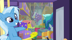 Size: 1280x720 | Tagged: safe, screencap, character:trixie, species:pony, species:unicorn, episode:on the road to friendship, cannon, clutter, female, grin, mare, messy mane, smiling, solo, trixie's wagon