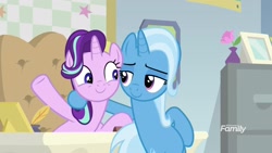 Size: 1920x1080 | Tagged: safe, screencap, character:starlight glimmer, character:trixie, species:pony, species:unicorn, episode:on the road to friendship, desk, duo, female, looking at each other, mare, smiling