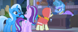 Size: 1920x805 | Tagged: safe, screencap, character:desert flower, character:mrs. trotsworth, character:starlight glimmer, character:trixie, species:pony, species:unicorn, episode:on the road to friendship, clothing, female, hijab, key, mare, mouth hold, somnambula (location), somnambula resident, tail wrap