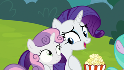 Size: 1280x720 | Tagged: safe, screencap, character:rarity, character:sweetie belle, species:pony, species:unicorn, episode:forever filly, g4, my little pony: friendship is magic, duo, female, filly, foal, food, grass, mare, popcorn, sisters, smiling