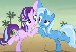 Size: 736x506 | Tagged: safe, screencap, character:starlight glimmer, character:trixie, species:pony, species:unicorn, episode:on the road to friendship, bipedal, cheek to cheek, coconut tree, cropped, cute, desert, diatrixes, duo, duo female, female, friendship chant, glimmerbetes, mare, messy mane, squishy cheeks
